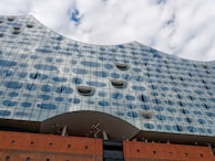 The Web project in Australia, highlighting modern architectural design with glass facades reflecting the sky.