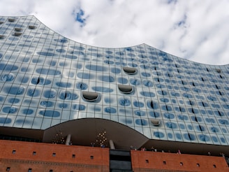 The Web project in Australia, highlighting modern architectural design with glass facades reflecting the sky.