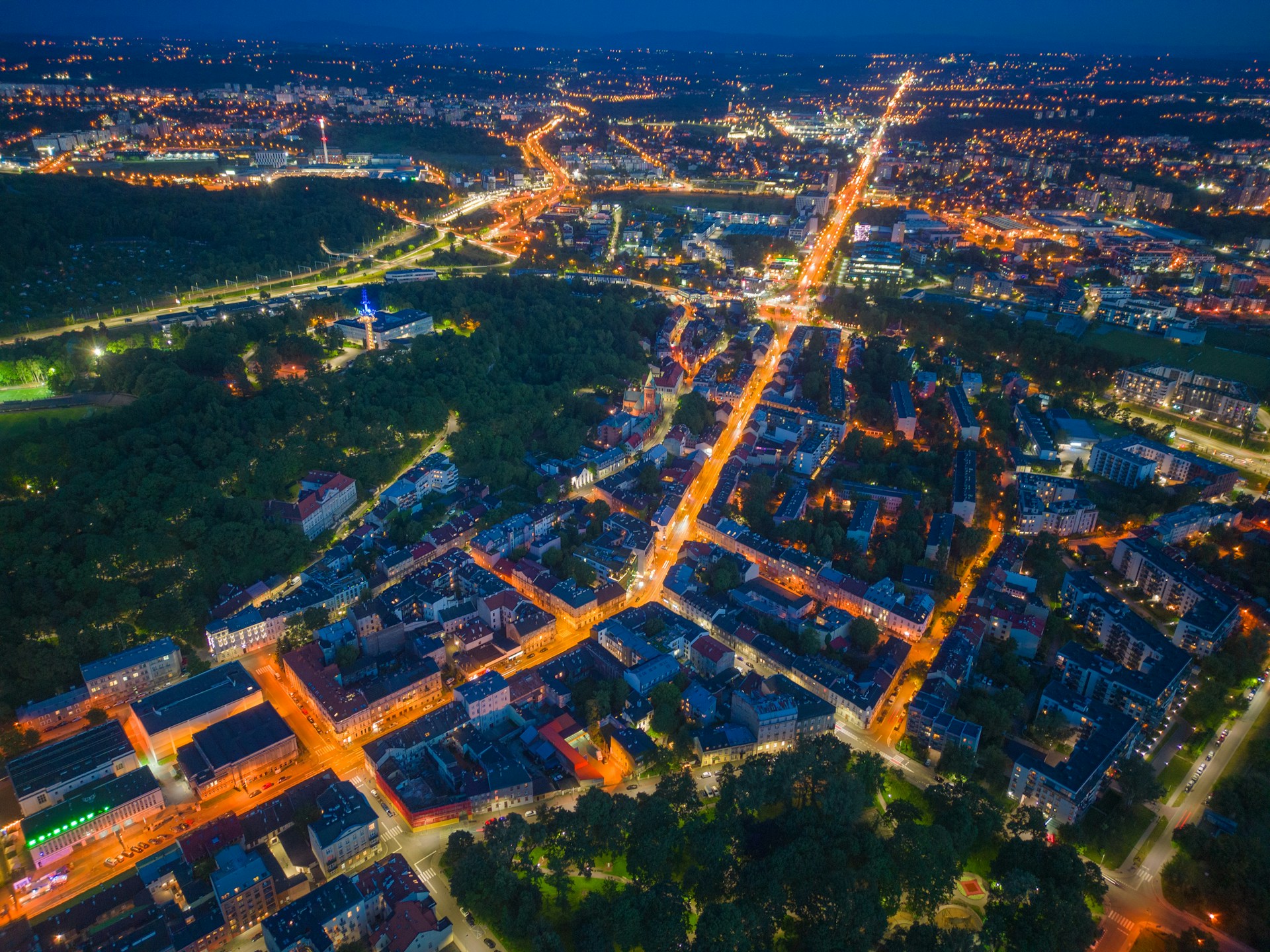 an aerial view of a city at night