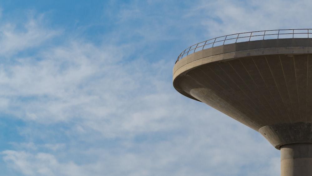 a tall tower with a sky background