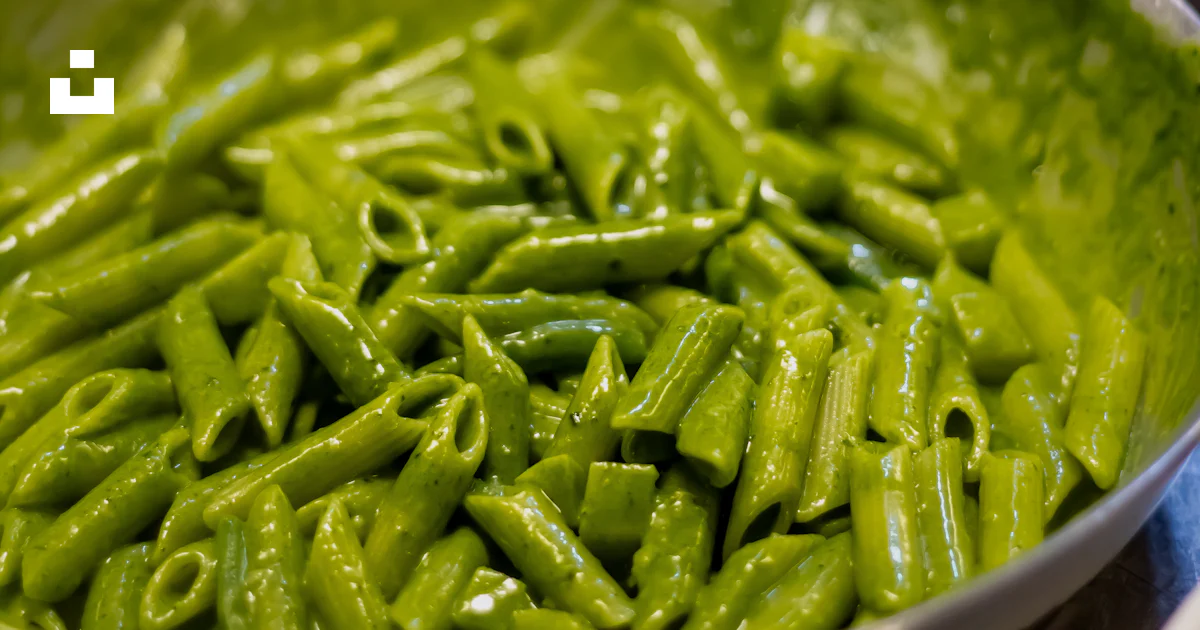 Pasta Rama Rama A pan filled with green pasta on top of a stove photo – Free Io italian ...