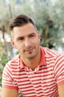a man in a red and white striped shirt