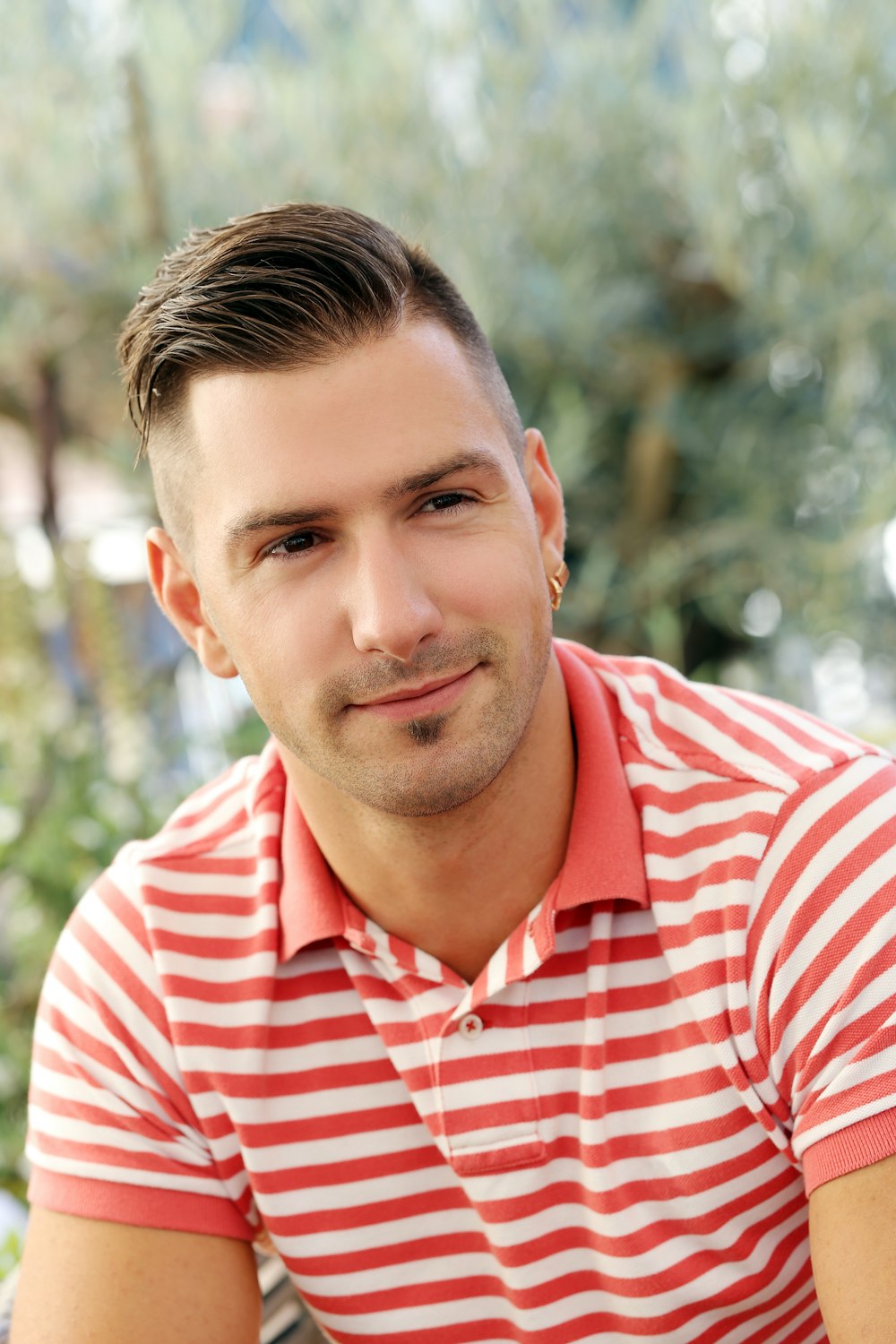 a man in a red and white striped shirt
