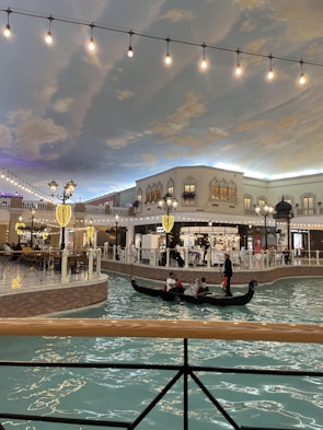 Warm interior of La Gondola with colorful walls and rustic wooden tables.