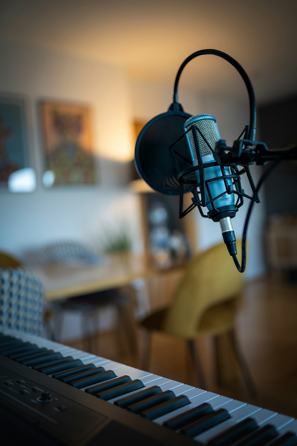 a microphone and a keyboard in a room