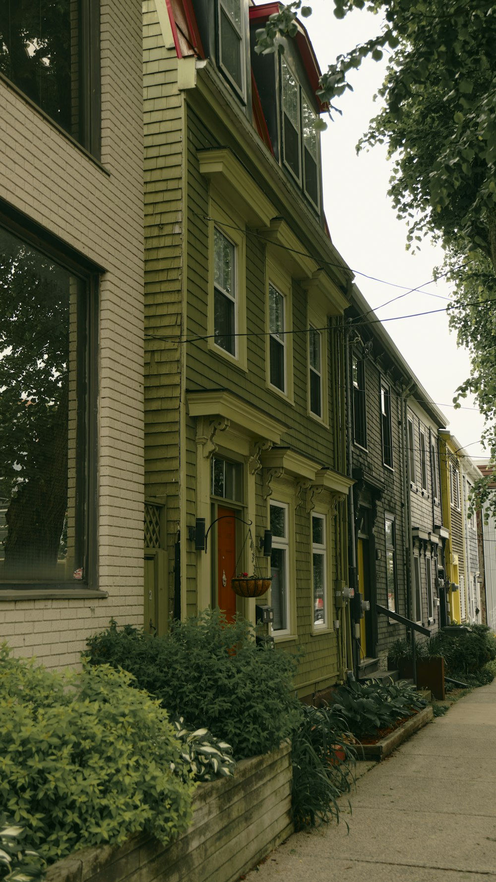 a row of houses on a city street