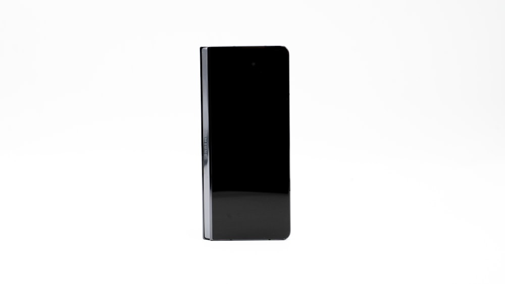 a black rectangular object on a white background