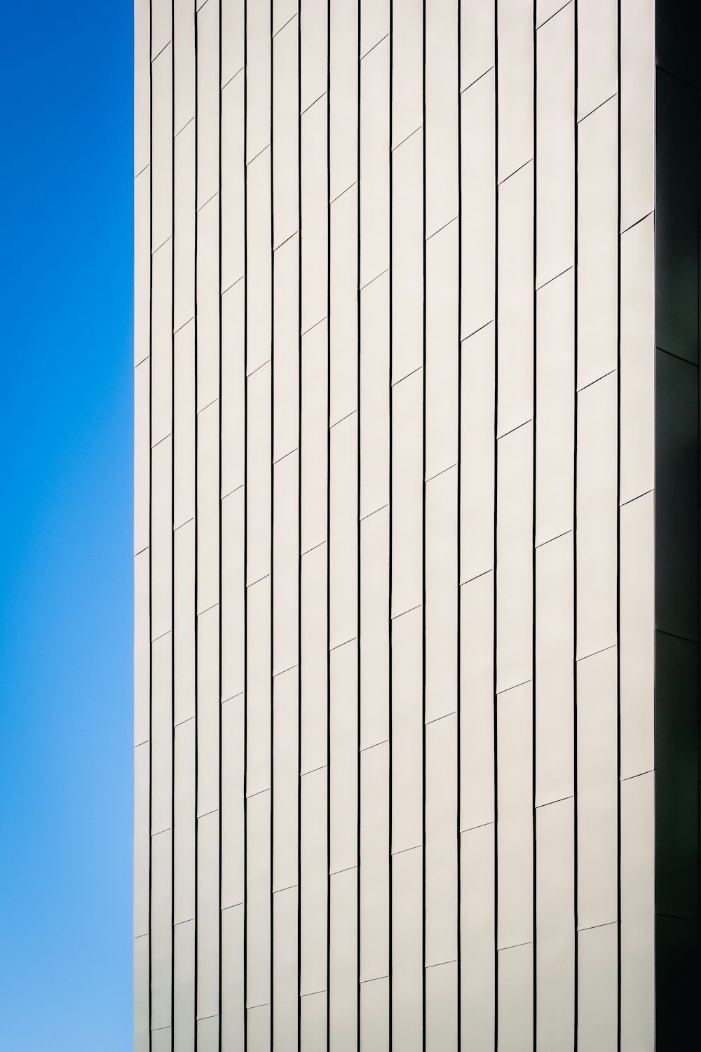 a tall building with a clock on the side of it