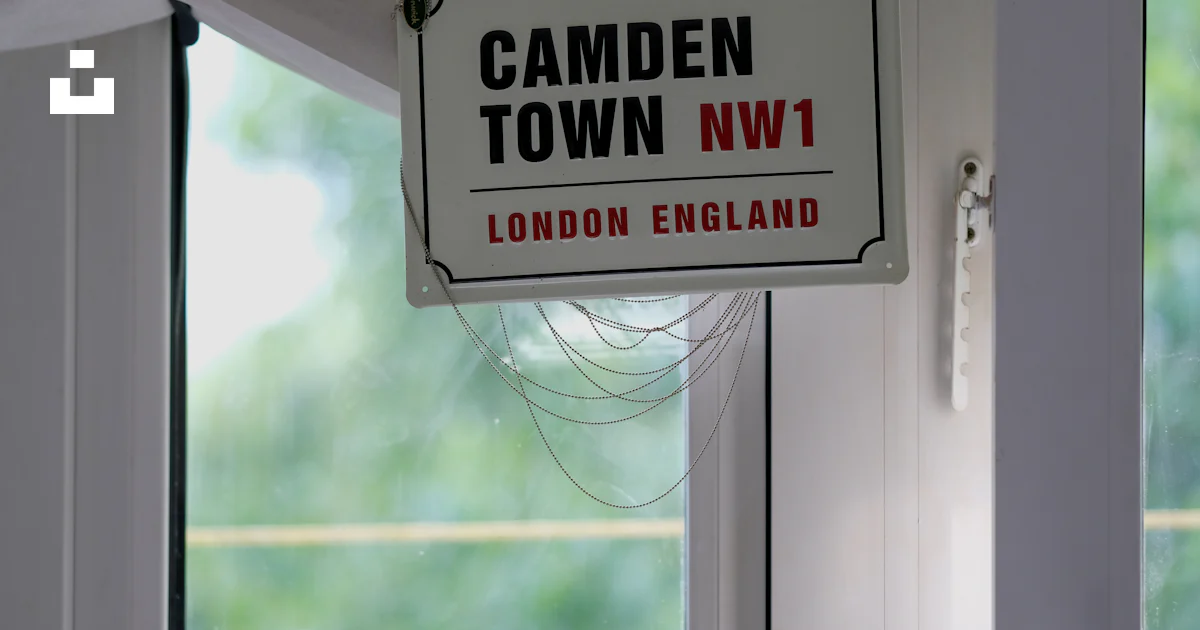 Window Window Sign Hung A sign hanging from the side of a window photo – Free Gospel oak Image ...