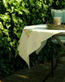 a table with a white table cloth on it