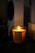 A happy customer enjoying a scent device in a cozy home setting.