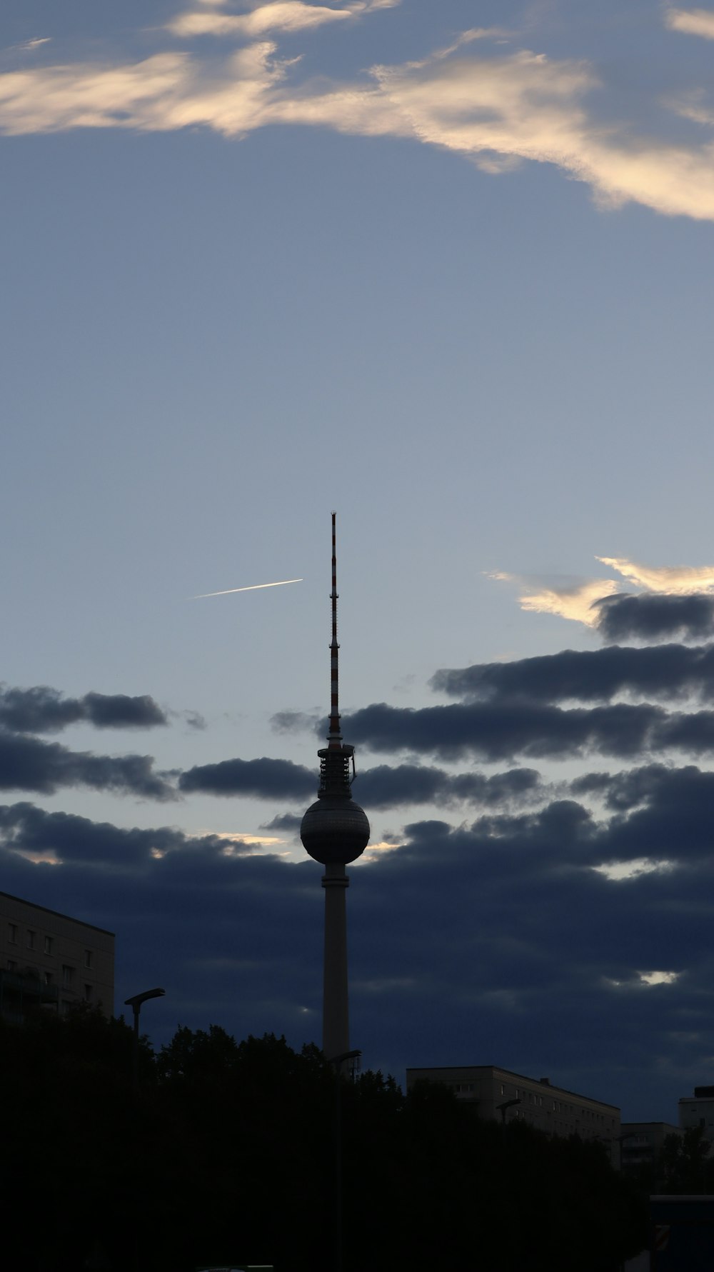 a very tall tower with a sky background