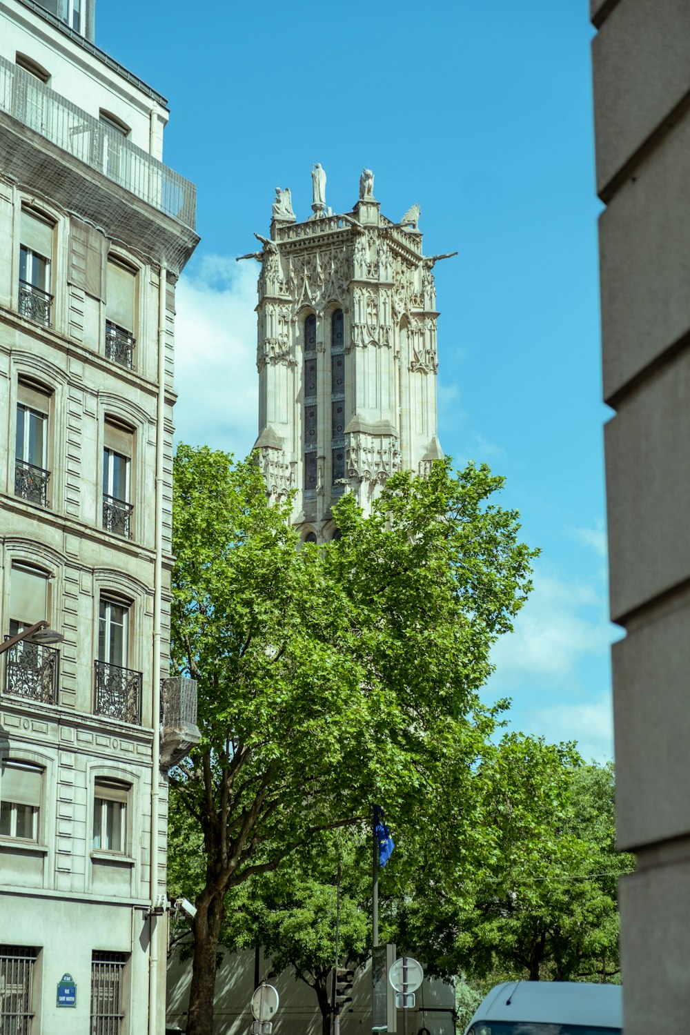 a tall building with a clock on the top of it