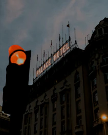 Hotel Ashok Palace exterior glowing warmly at dusk
