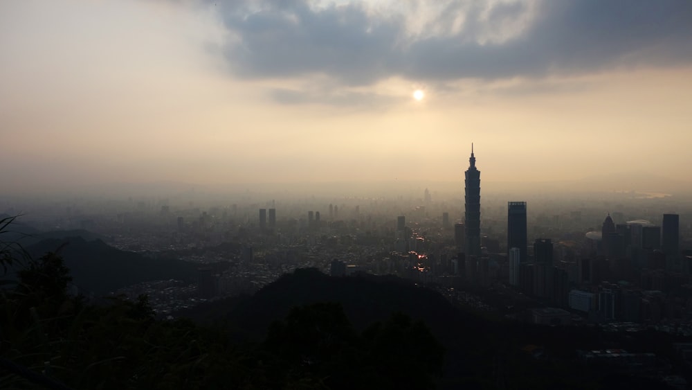 a view of a city from the top of a hill