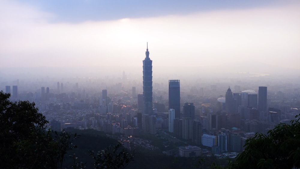 a view of a city with tall buildings