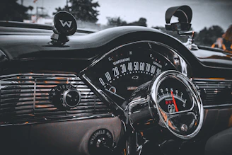 Interior car parts including dashboards and speedometers in great condition.