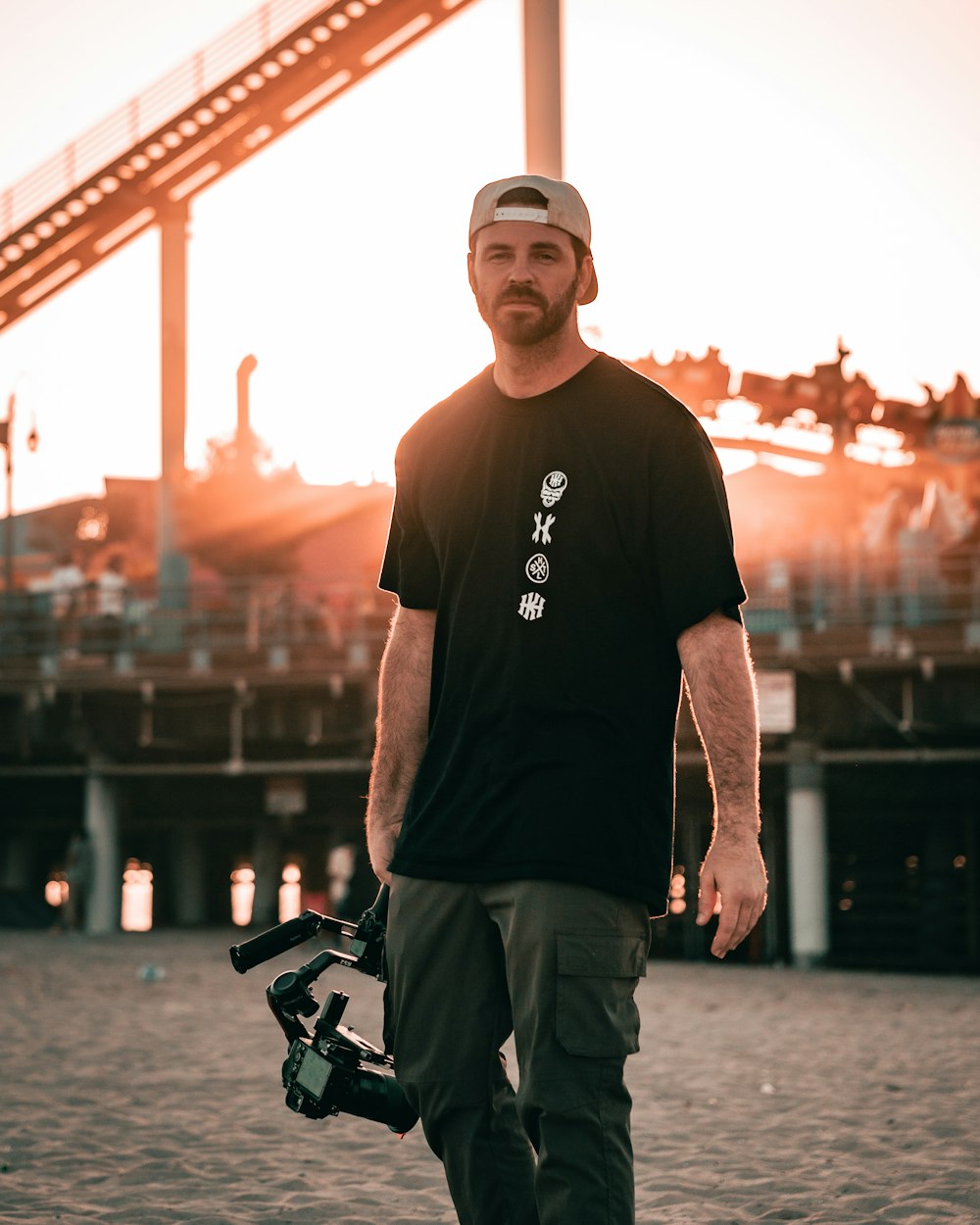 a man holding a skateboard and a helmet