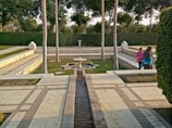 A serene garden space where people gather for discussion.