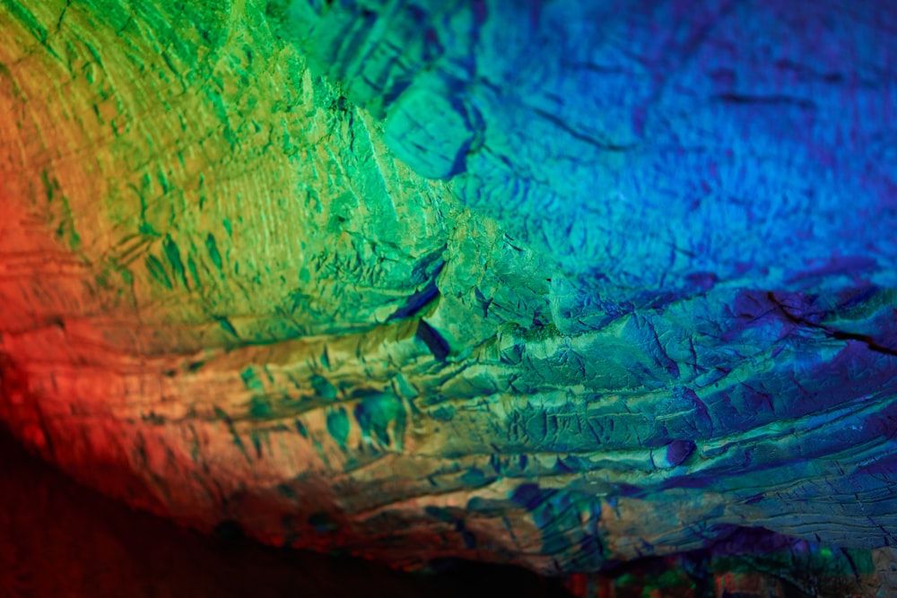 a close up of a rainbow colored surface