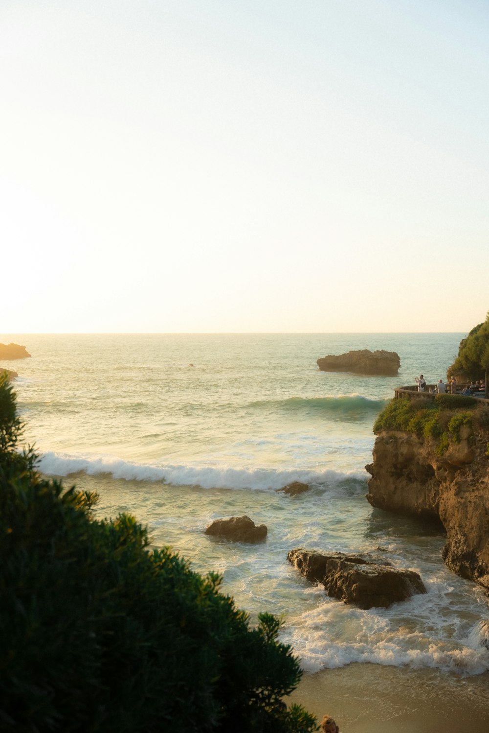 a view of the ocean from a cliff