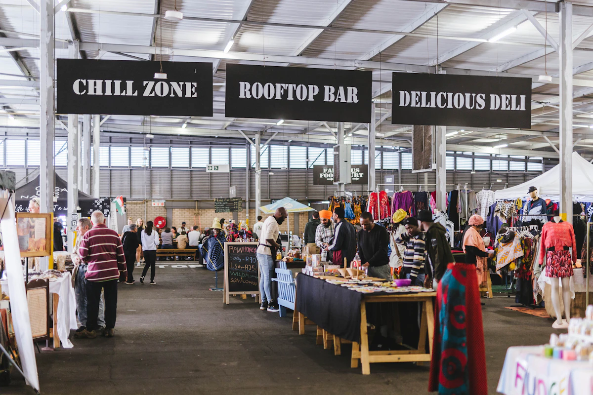 Rosebank Sunday Market in Johannesburg, South Africa: a vendor at her store