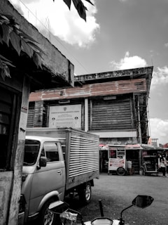 Photo of a mobile vehicle inspection setup in a busy urban area