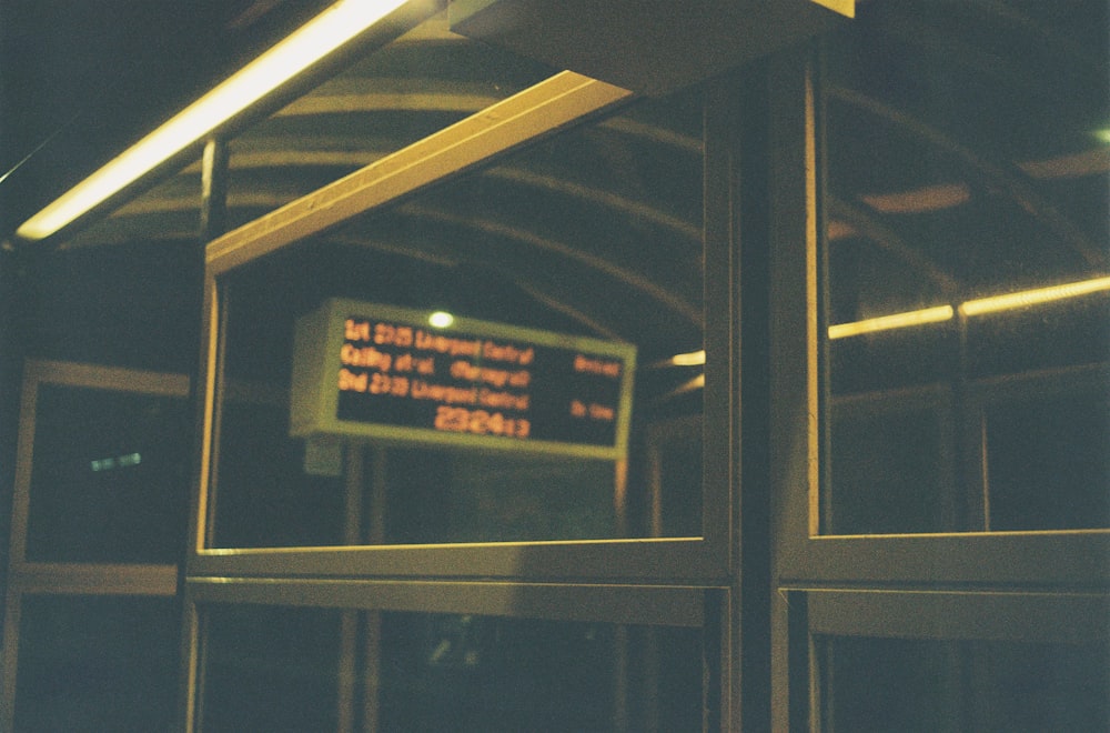 a close up of a sign on a glass door