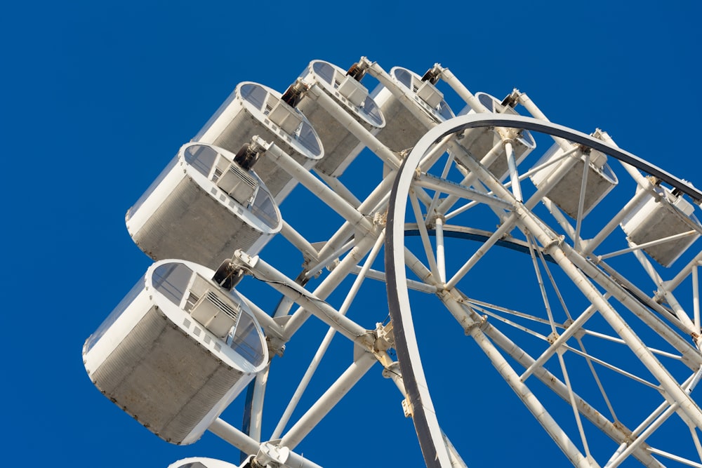 a ferris wheel against a clear blue sky