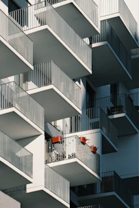 an apartment building with balconies and balconies on the balconies