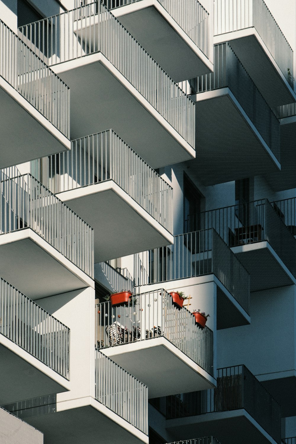 an apartment building with balconies and balconies on the balconies