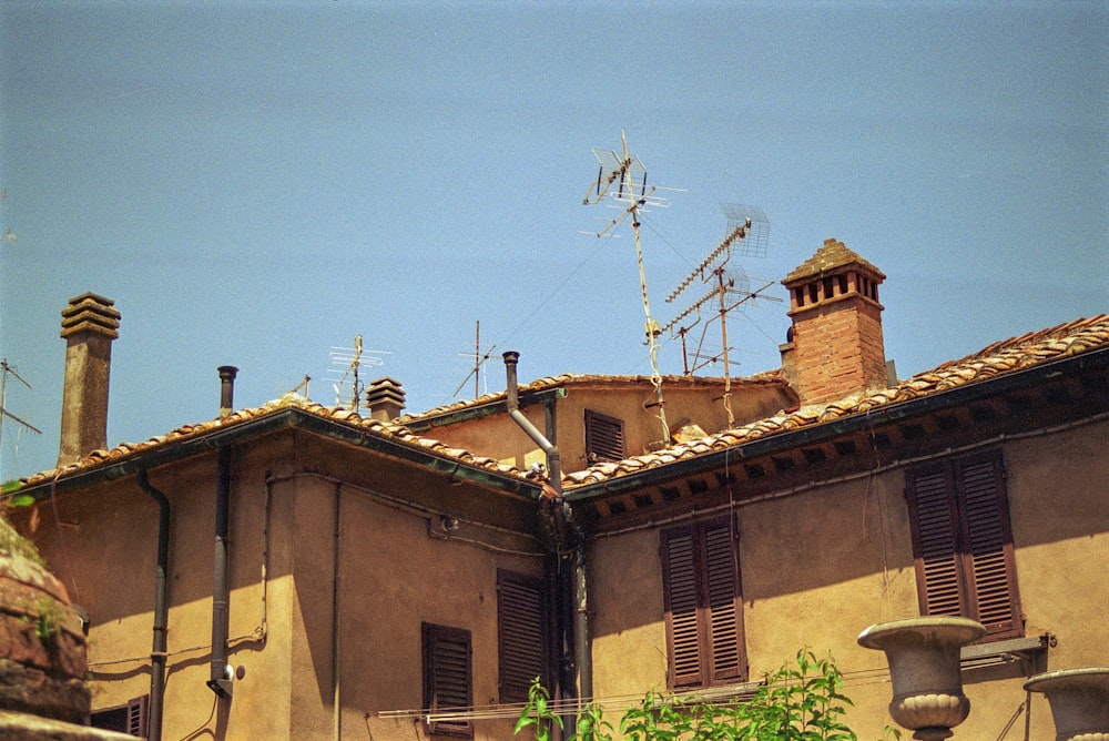 a tall building with a clock on the top of it