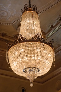 a chandelier hanging from a ceiling in a room