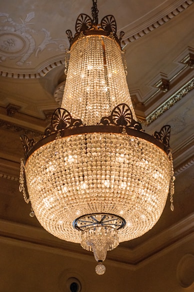 a chandelier hanging from a ceiling in a room