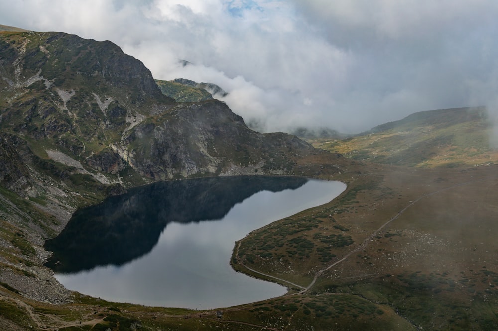 a large body of water surrounded by mountains