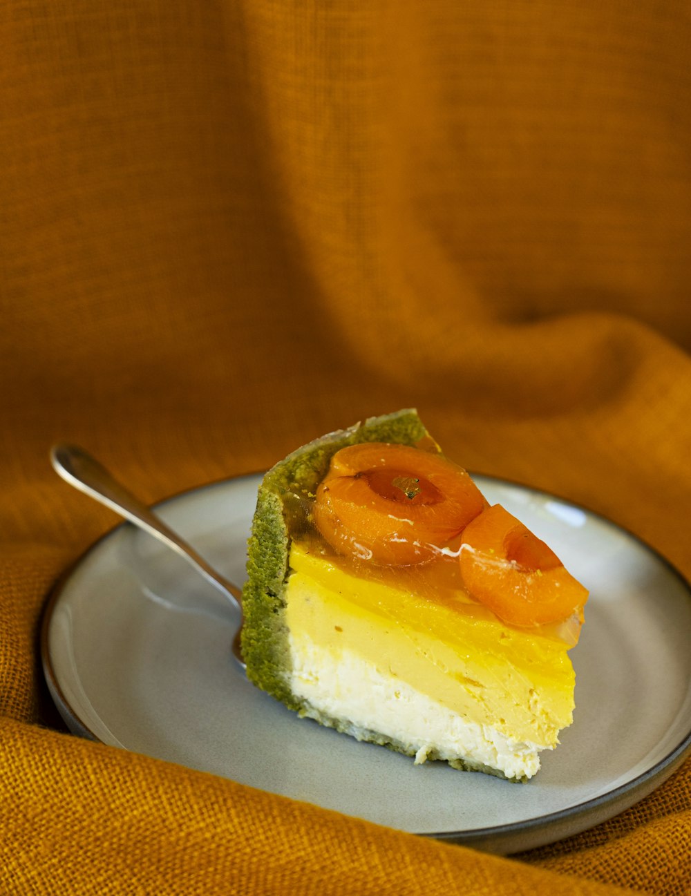 a piece of cake on a plate with a fork