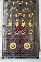 A beautifully crafted metal gate with intricate designs.