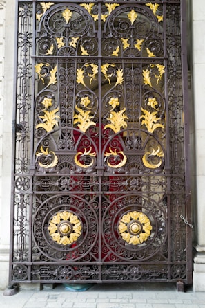 A beautifully crafted metal gate with intricate designs.