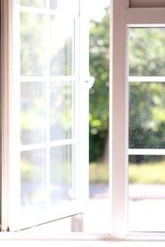 A freshly installed modern window letting in natural light.