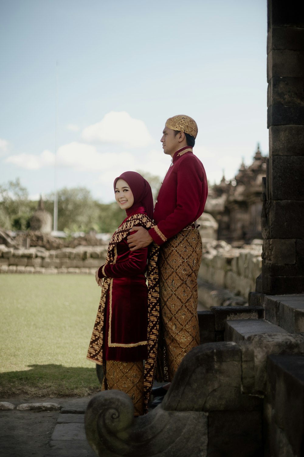 a man and a woman standing next to each other