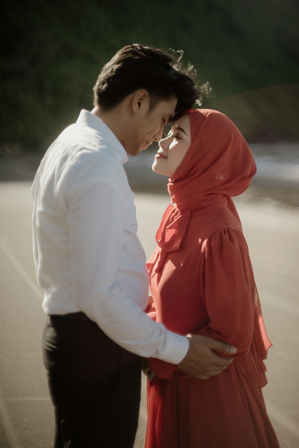 a man and a woman standing next to each other