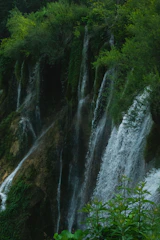 A floating island with cascading waterfalls and vibrant flora.
