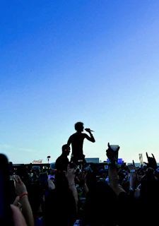 Ridopro interacting with fans after a show, signing autographs