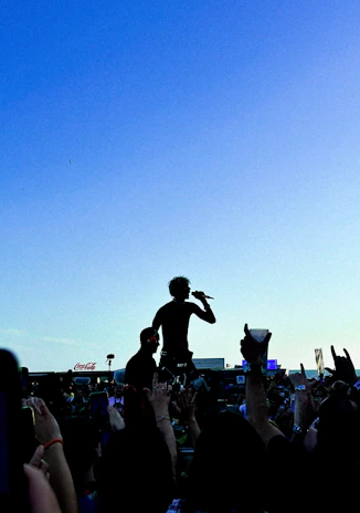 Ridopro interacting with fans after a show, signing autographs