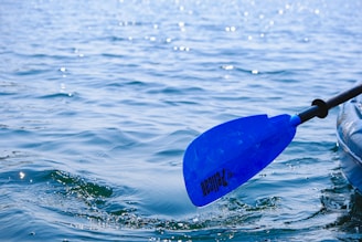 Lightweight aetherion zeropoint lite paddle showing slim 13mm core and electric cyan highlights