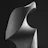 Close-up of a delicate abstract sculpture with soft natural light highlighting its organic curves.