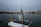 Close-up of a lithium marine battery installed on a fishing boat with calm sea background.