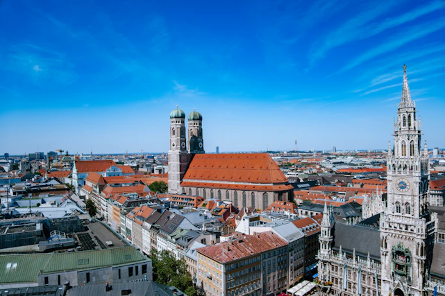 a majestic panoramic view of Prague's historic skyline under a clear blue sky