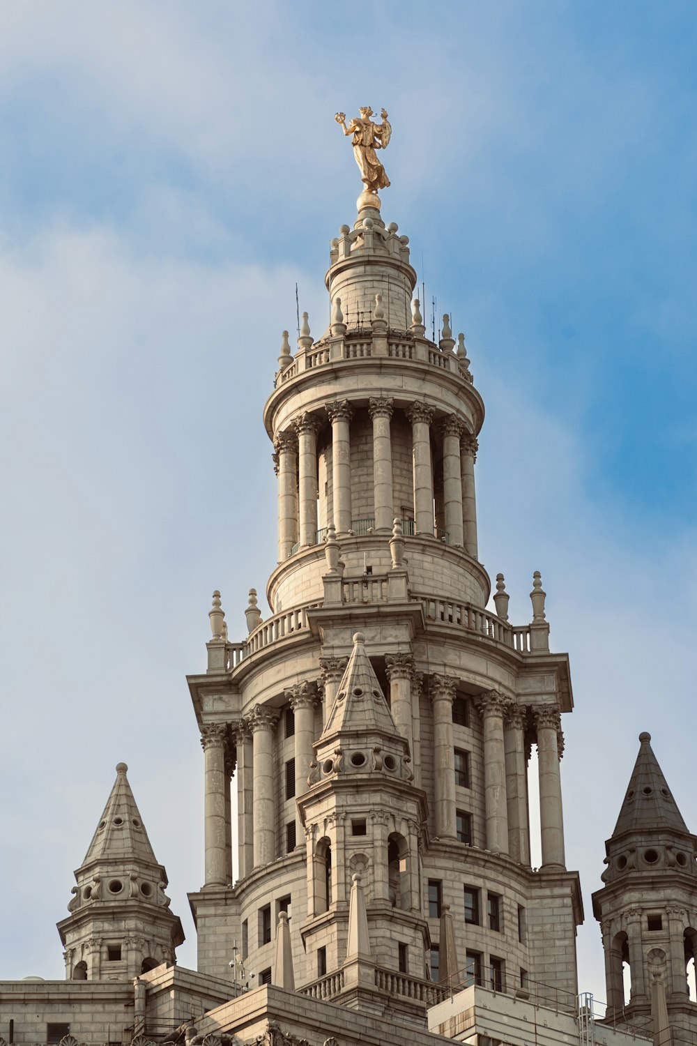 a very tall building with a clock on it's side