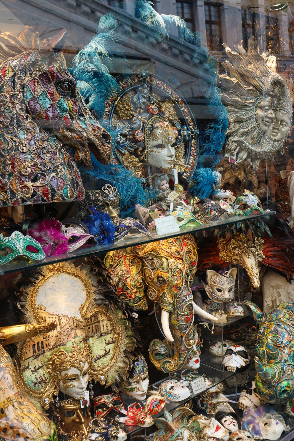 a store window with masks and masks on display